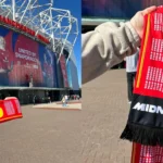 Man City's 115 charges scarves made by United fans